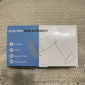 Brand new electric spin scrubber. 4 different types of cleaning brushes.